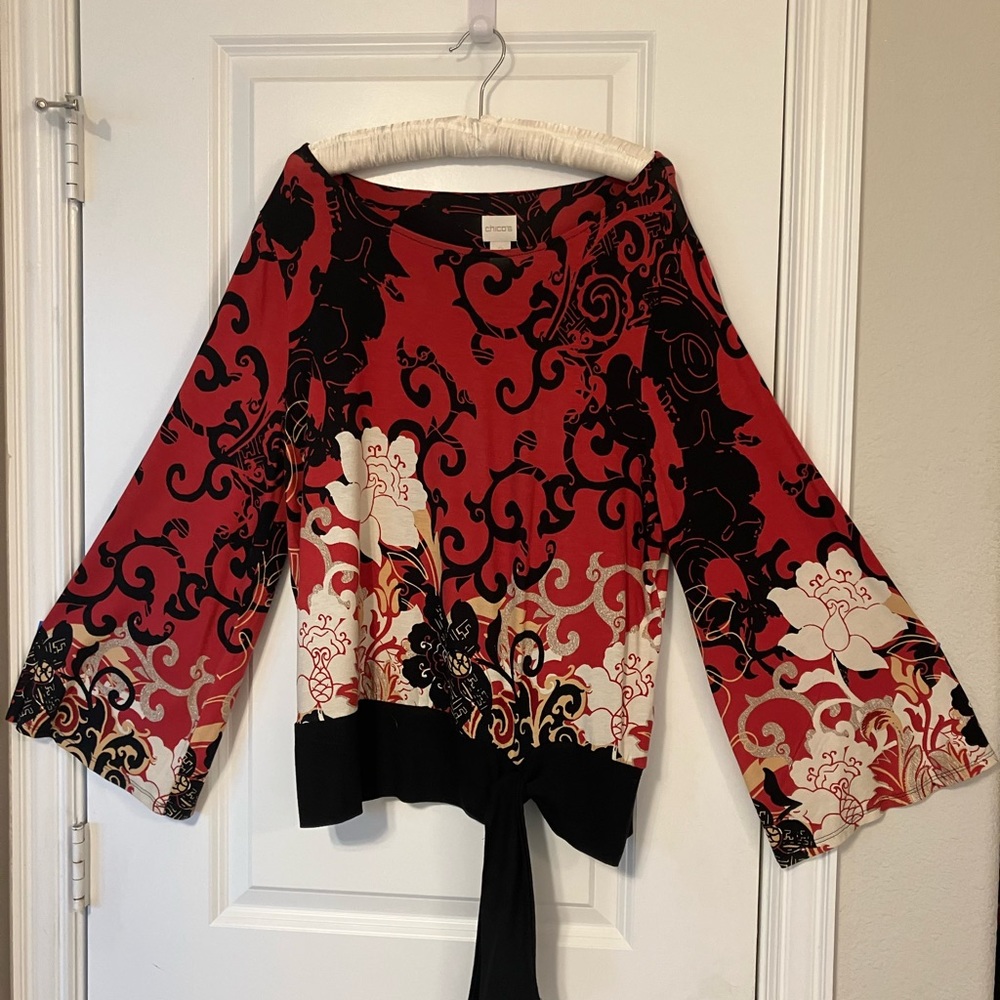 Chicos Jersey knit multi colored top.